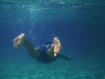 Man swimming in sea