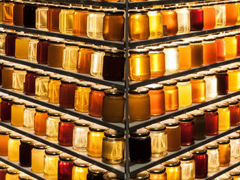 Full frame shot of bottles in shelf