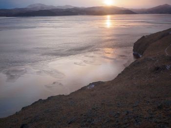 Scenic view of sea against sky during sunset