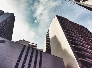 Low angle view of modern buildings against sky