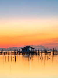 Scenic view of sea against sky during sunset