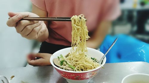 Close-up of woman preparing food