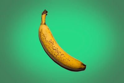 Close-up of apple against blue background