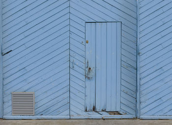 Reflection of building on door