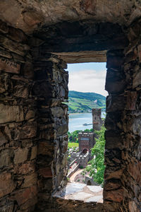 View of sea seen through arch window