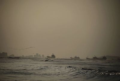 Scenic view of sea at sunset