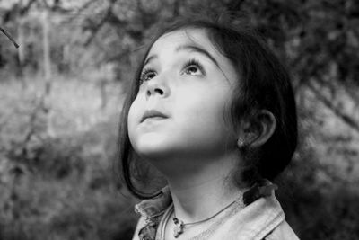 Portrait of girl looking up