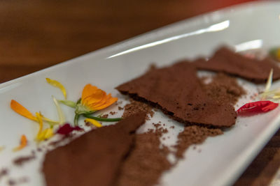 Close-up of cake served on table