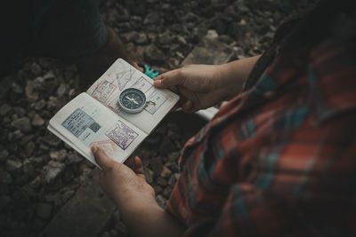 High angle view of person holding hands