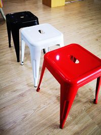 High angle view of empty chair on table at home