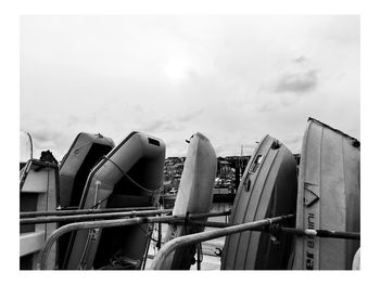 Low angle view of factory against sky
