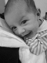 Close-up portrait of cute baby at home