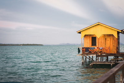 Little hut with sunrise lights near the egang - egang and bum bum island in semporna, borneo sabah.