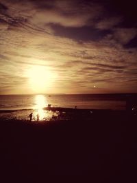 Scenic view of sea at sunset