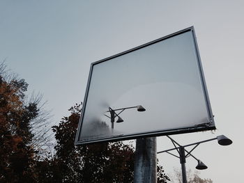 Low angle view of basketball hoop against sky