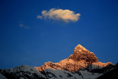 Snow covered mountain against sky