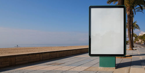 Close-up of sea against clear blue sky