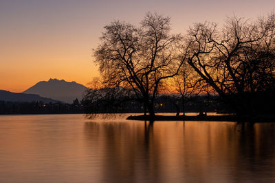 Scenic view of lake against sky during sunset in zugersee
