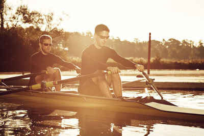 Young men canoeing
