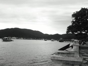 Scenic view of sea against cloudy sky