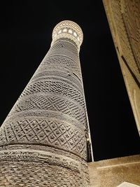 Low angle view of historical building against sky at night