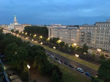 High angle view of illuminated cityscape against sky