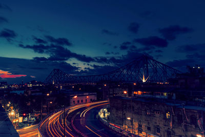 High angle view of light trails on road at night