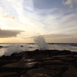 Scenic view of sea at sunset