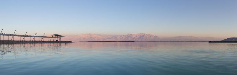 Scenic view of sea against clear sky during sunset dead sea west bank