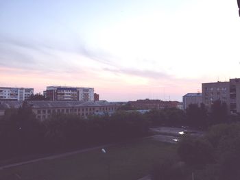 High angle view of city at sunset