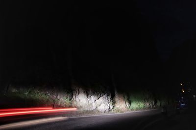 Light trails on road at night