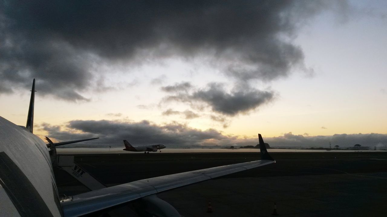 transportation, sky, mode of transport, cloud - sky, sunset, cloudy, silhouette, nautical vessel, road, cloud, sea, nature, land vehicle, travel, the way forward, water, outdoors, railing, one person, airplane