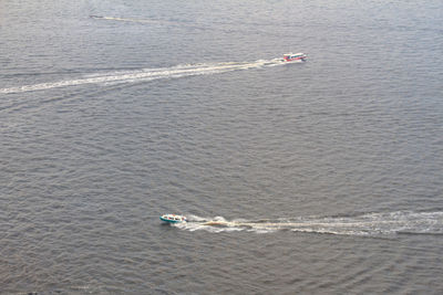 High angle view of boats sailing in sea