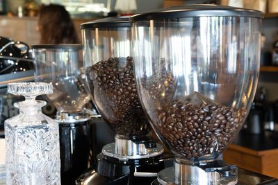 Close-up of coffee cups on table in kitchen