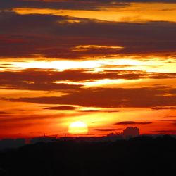 Scenic view of dramatic sky during sunset