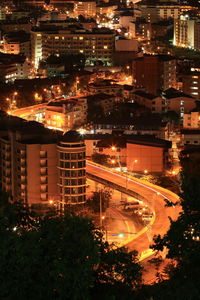 High angle view of illuminated buildings at night