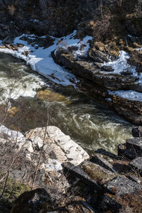 High angle view of rocks in river