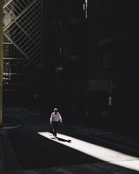 Woman walking on road