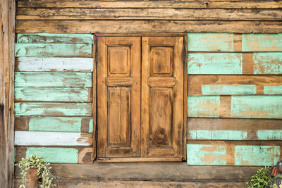 Wooden window on wall