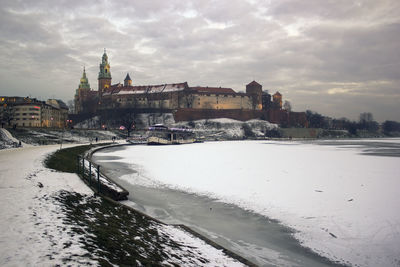 View of snow covered buildings in city