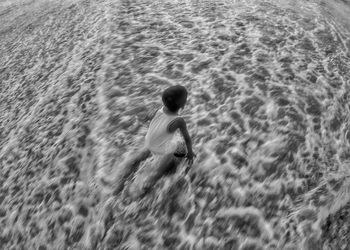 High angle view of person swimming in sea