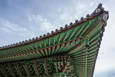 Low angle view of roof of building against sky