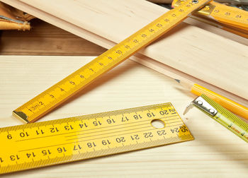 Close-up of ruler on table