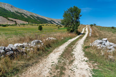 Scenic view of land against sky