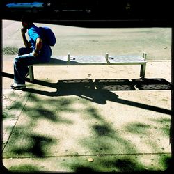 Woman sitting on bench