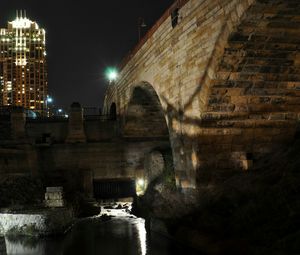 Reflection of illuminated built structures in water