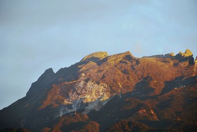 Low angle view of mountains against sky