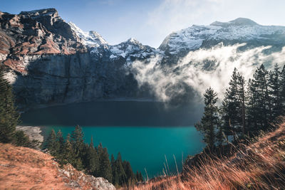 Scenic view of snowcapped mountains against sky