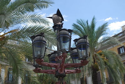 Low angle view of statue against trees