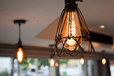 Close-up of illuminated light bulb